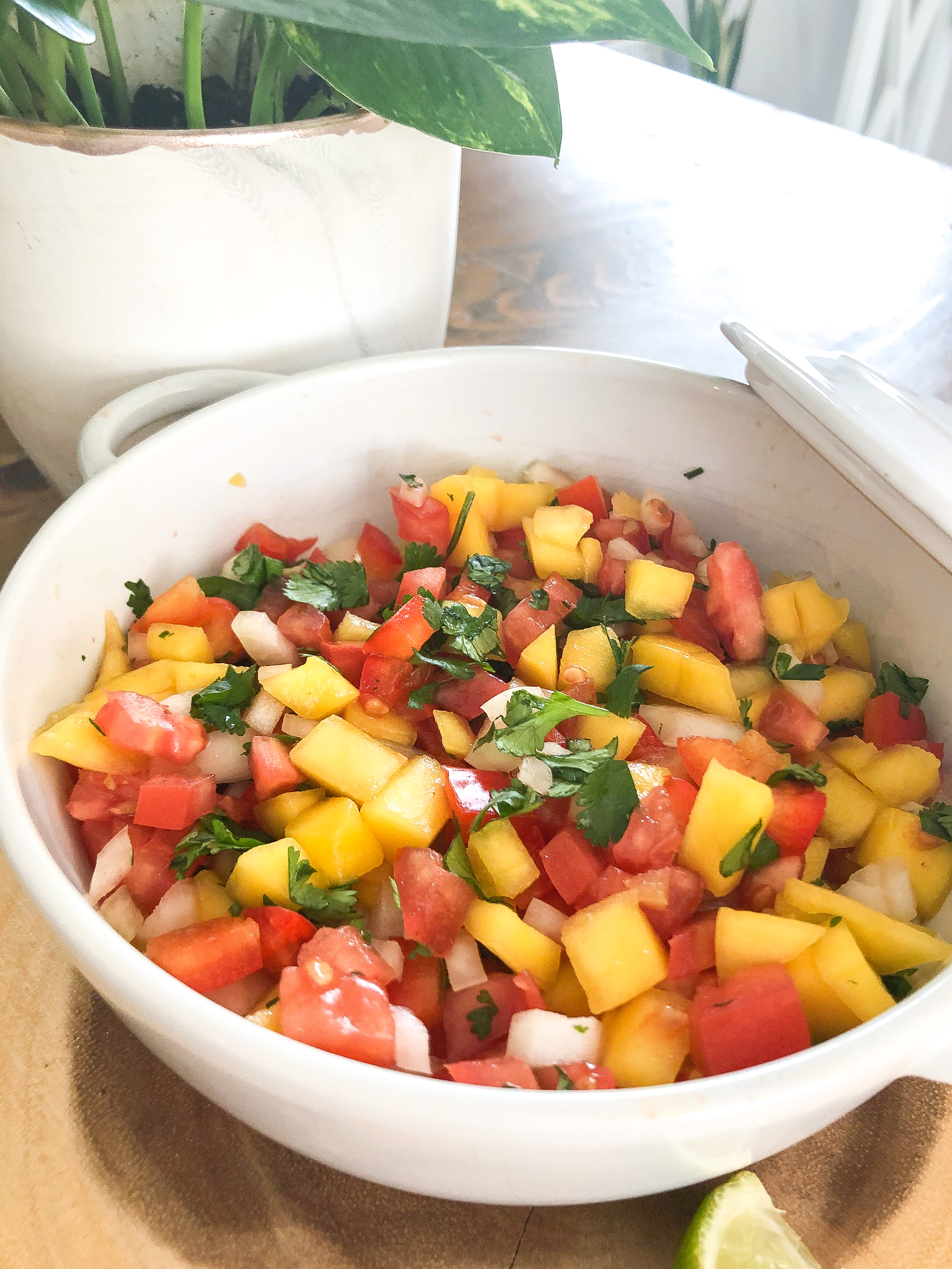 A bowl of fresh mango salsa.
Mango salsa chicken meal prep. 
